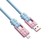 Building Block Charging Cable close-up of pale blue and pink housings with USB-A, USB-C and Lightning connectors