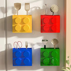 Building Block Storage Bins — All four colors holding kitchen tools in a two-by-two refrigerator display.