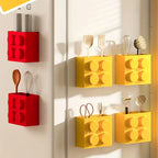 Building Block Storage Bins — Supplier styling example with multiple red and yellow bins holding kitchen tools.