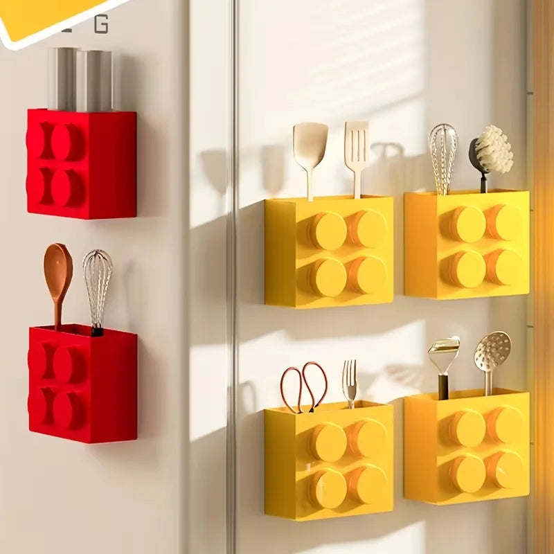 Building Block Storage Bins — Supplier styling example with multiple red and yellow bins holding kitchen tools.