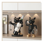 Bulldog Wine Bottle Holder wide kitchen cabinet scene showing both black styles with bottle and stemware.