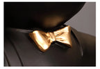 Bulldog Wine Bottle Holder close-up of the gold-tone bow tie against the black bulldog figurine.