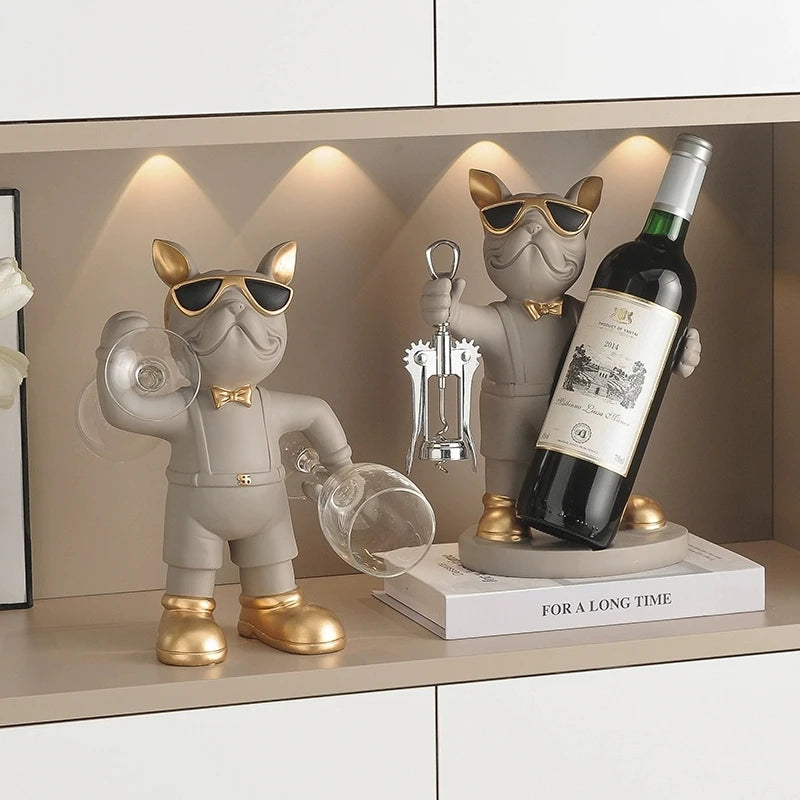 Bulldog Wine Bottle Holder grey bottle and glass styles on a sideboard, with the bottle style raised on a book.