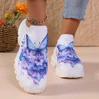 Butterfly Knit Shoes Blue Butterfly shoes from the front, highlighting the blue butterfly wings and floral print.