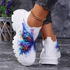 Butterfly Knit Shoes Colorful Butterfly shoes showing the printed front and plain white heel with a pull tab.
