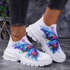 Butterfly Knit Shoes Colorful Butterfly pair worn with cropped black jeans, showing the printed sides and white soles.