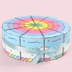 Cake Slice Favor Boxes in blue forming a full cake-shaped display secured with coordinating ribbon