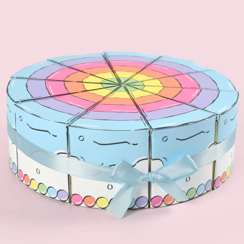 Cake Slice Favor Boxes in blue forming a full cake-shaped display secured with coordinating ribbon