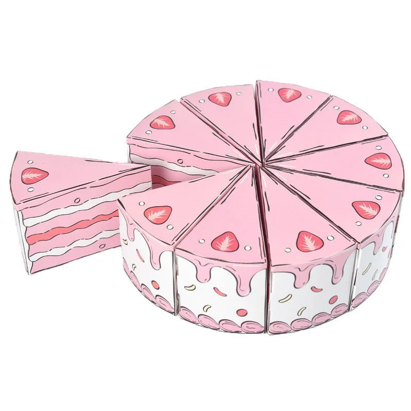 Cake Slice Favor Boxes in pink forming a strawberry cake display with two individual boxes outside