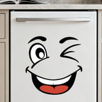 Cartoon Face Stickers Pack winking expression applied to a smooth white cabinet door