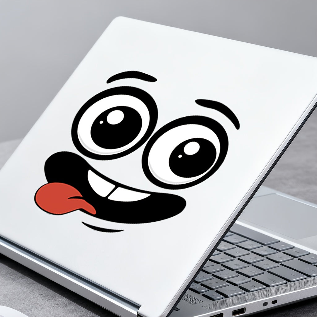 Cartoon Face Stickers Pack silly cartoon expression applied to the lid of a silver laptop