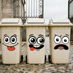 Cartoon Face Stickers Pack decorating three white outdoor trash cans with playful expressions
