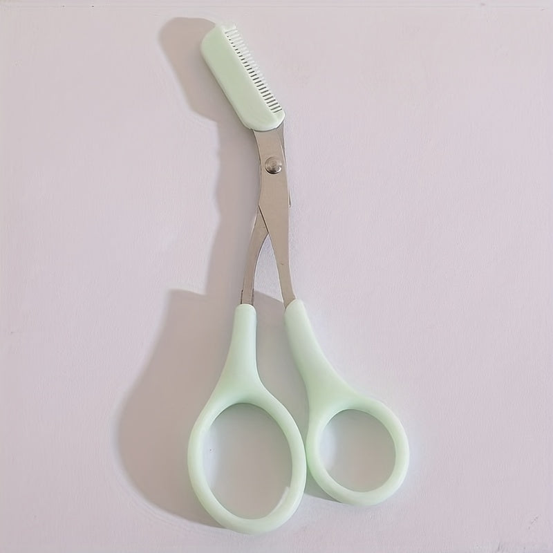 BrowCraft™ eyebrow trimming scissors with built-in comb and mint green handles on light background by HighPeak
