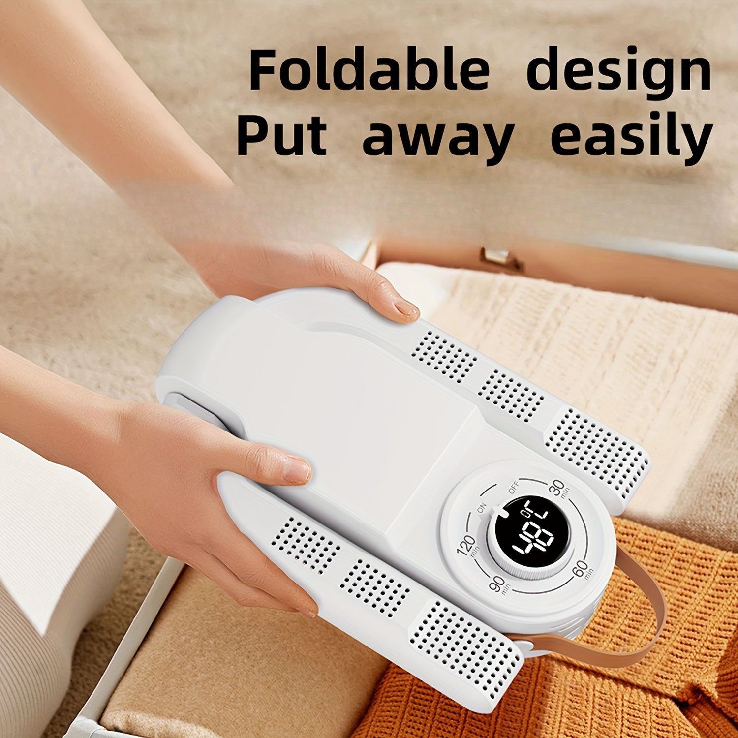 ShoeJet™ shoe dryer in white with foldable arms being stored on a beige surface, showcasing compact design by HighPeak.