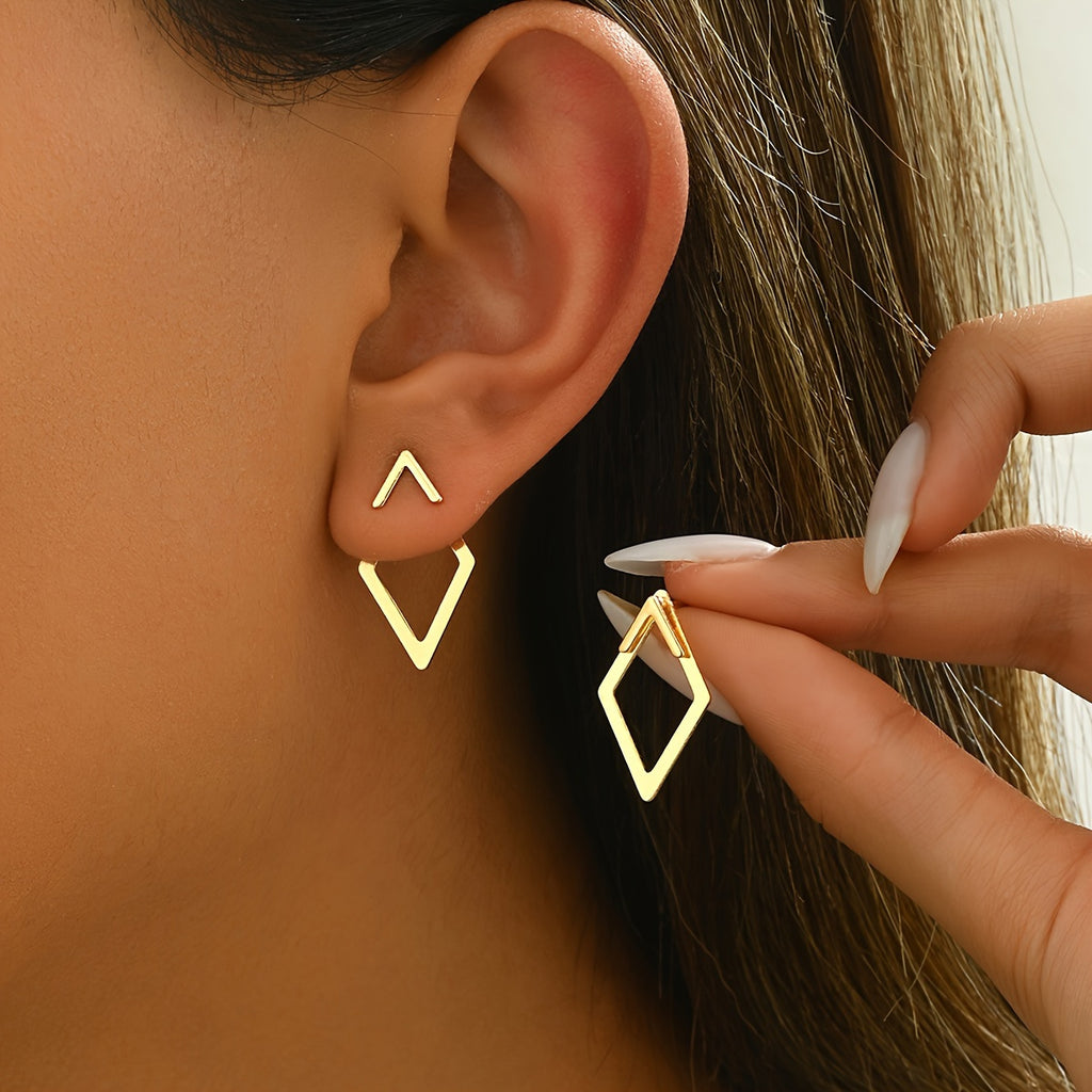 HighPeak Geometric Gold Earrings in gold-plated copper showing two distinct geometric shapes on ear and hand.