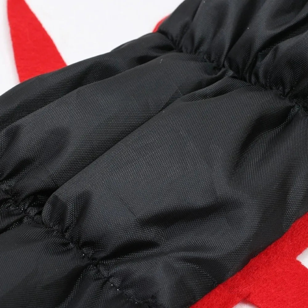 Centipede Pet Costume close-up of the black segmented fabric, stitched seams and red leg accents.
