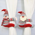 Christmas Chandelier Hugger Santa and snowman pair shown close up on two white curtain panels
