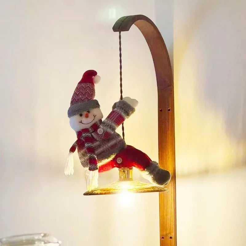 Christmas Chandelier Hugger snowman character wrapped around a tall arched lamp with warm light