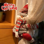 Christmas Chandelier Hugger snowman character wrapped around a curtain beside Merry Christmas text