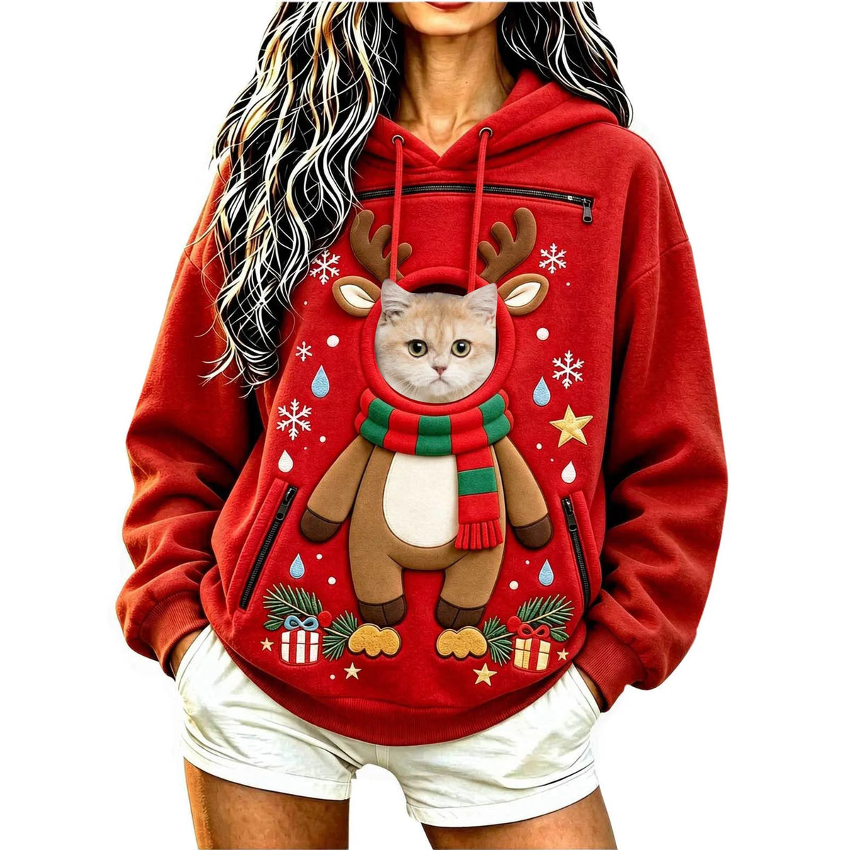 Model wearing a red reindeer Christmas Pet Carrier Hoodie with a cat peeking through the front pouch opening.