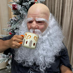 Christmas Santa Mask worn without a hat while holding a patterned mug near the white moustache.