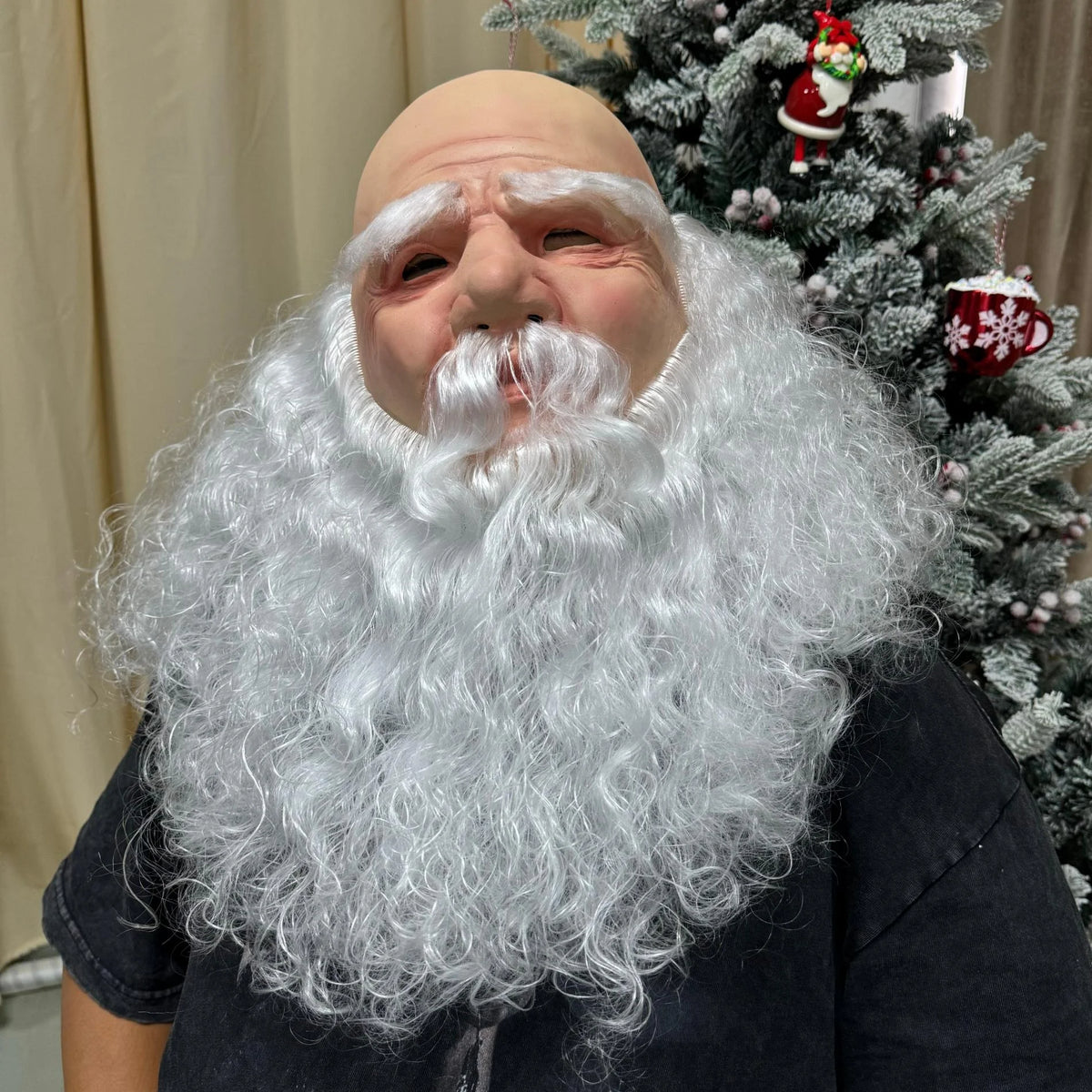 Three-quarter view of the Christmas Santa Mask with white eyebrows, moustache and long curly beard.
