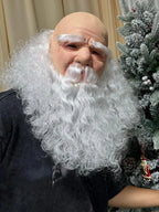 Close portrait of the Christmas Santa Mask without a hat, showing the face and long white beard.