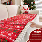 Christmas Sofa Pad Cover red quilted snowflake pattern shown close up while being positioned on a sofa