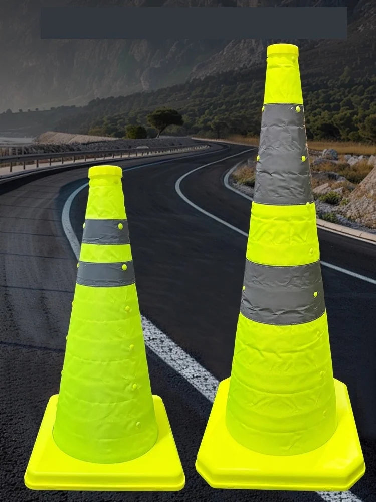 Collapsible Reflective Safety Cone in 45 cm and 70 cm sizes placed together on a roadside at dusk