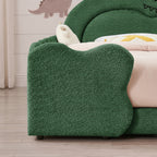 Close-up of rounded green bouclé footboard and textured upholstery