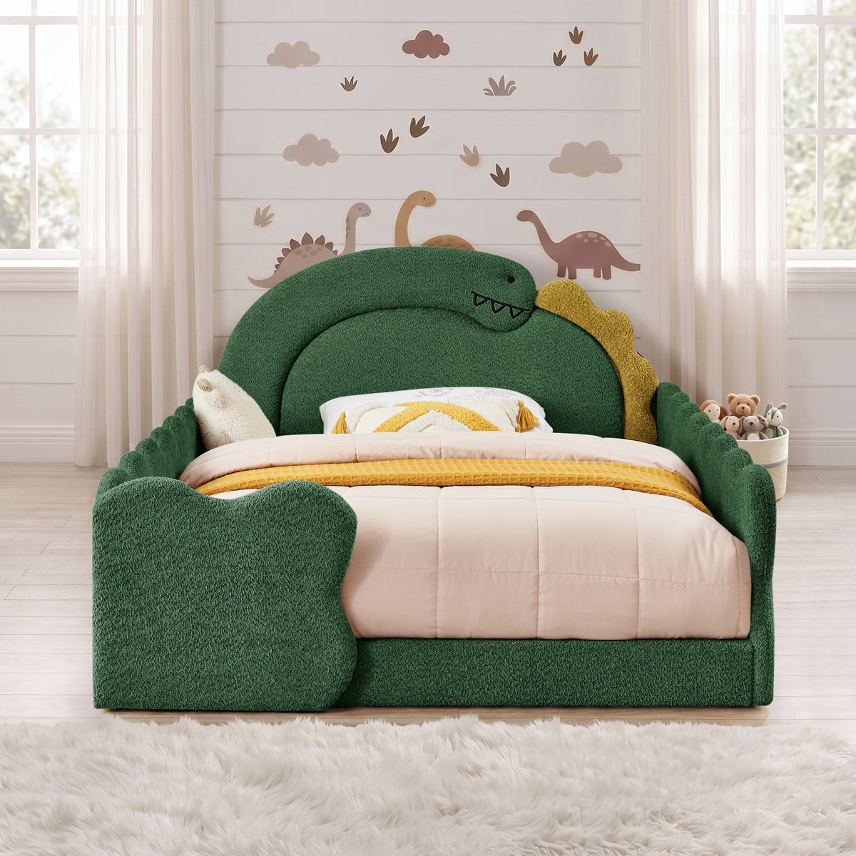 Green Cozy Dinosaur Dream Bed shown from the front with bedding in a dinosaur-themed bedroom
