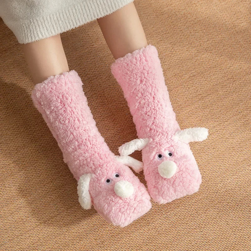 Cozy Dog Ear Socks in pink viewed from above, showing the puppy faces and fluffy texture