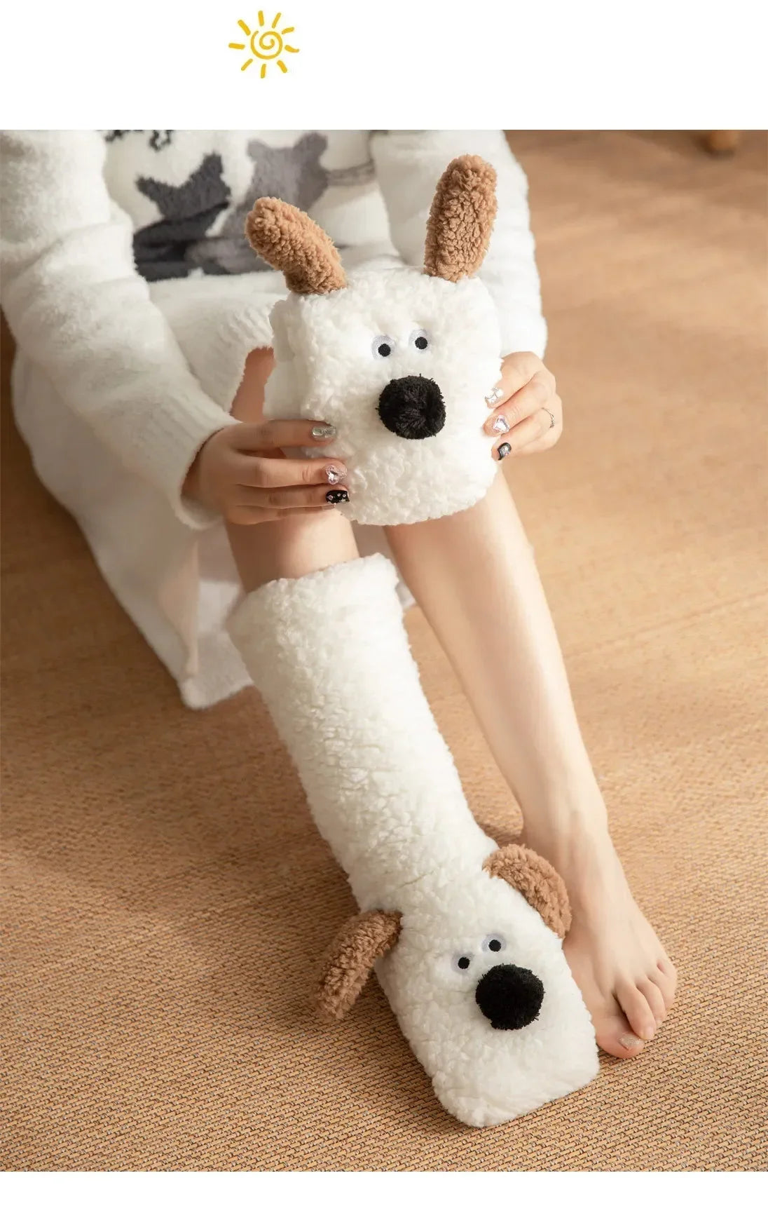 Cozy Dog Ear Socks in white, with one sock folded and held beside a matching sock worn on the foot