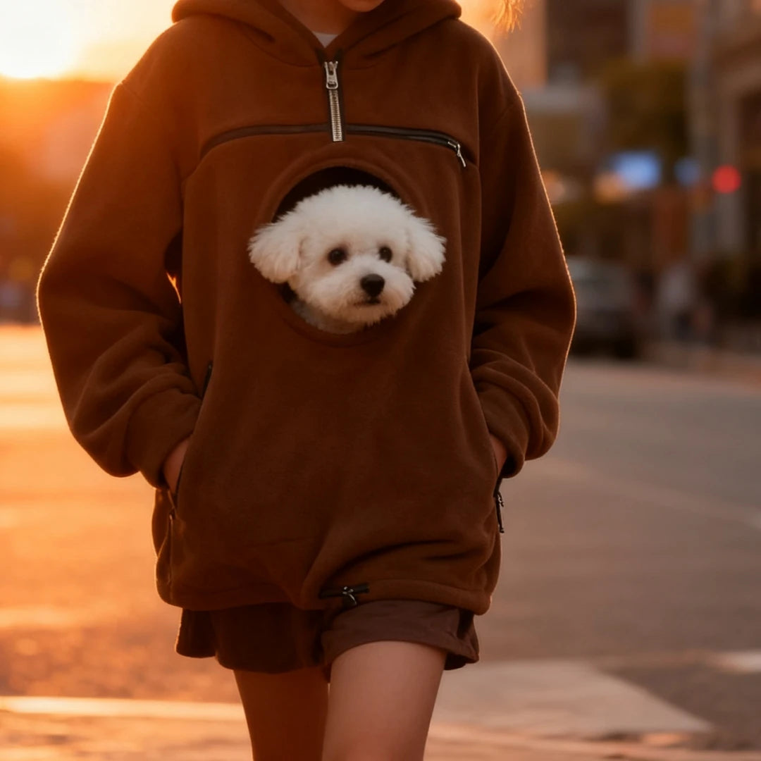 Cozy Pet Carrier Hoodie supplier lifestyle view in brown with a small dog during a sunset walk