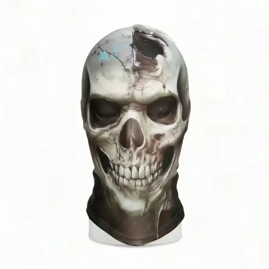 Cracked Skull Face Mask front view on a display head, showing the cracked skull artwork and extended neck panel.