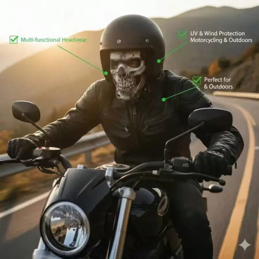 Cracked Skull Face Mask worn beneath a black helmet by a motorcyclist on a winding mountain road at sunset.