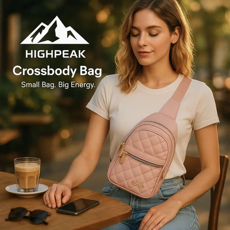 HighPeak Crossbody Bag in pink quilted finish worn by woman sitting at cafe table with coffee and phone nearby