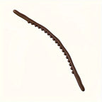 Curved Back Massage Stick shown diagonally with its brown arched body and single row of beads