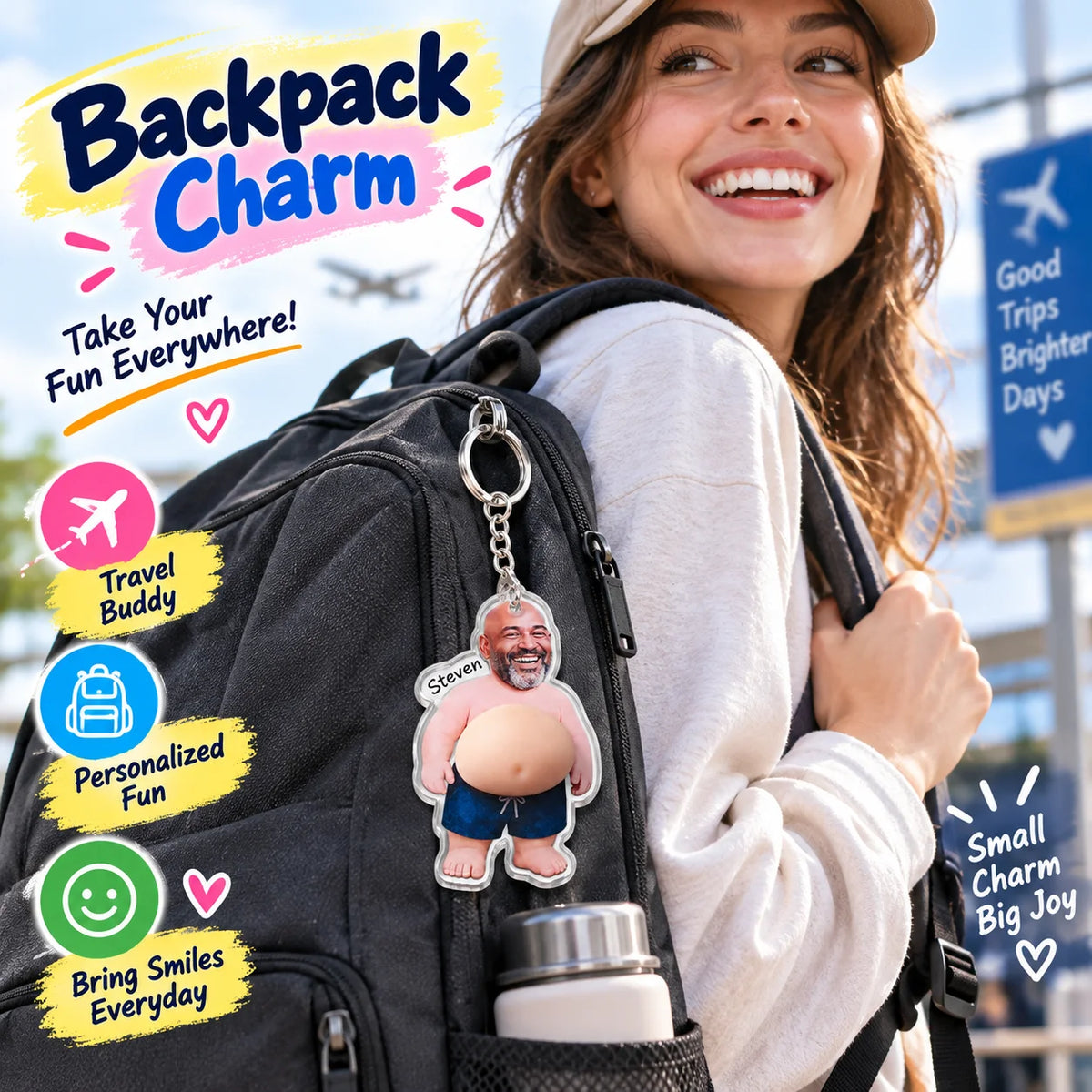 Custom squishy belly photo keychain hanging from a black backpack worn by a woman