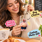 Woman squeezing the silicone belly of a custom photo keychain attached to a cream tote bag