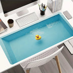 Cute Duck Desk Mat extended blue pool print on a white office desk with a monitor, keyboard and pen cup