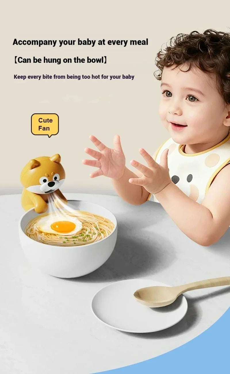 Cute Food Cooling Fan hanging over a bowl of noodles beside a young child at the table