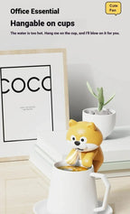 Cute Food Cooling Fan hanging on a white cup of hot drink beneath a cup-mounting feature heading
