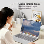 Cute Food Cooling Fan hanging from a laptop screen beside a person holding a mug