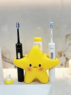 Cute Star Toothbrush Holder holding two electric toothbrushes and toothpaste in a front bathroom counter view