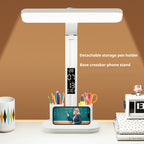Digital Display Desk Lamp with detachable pen cups and a phone supported horizontally in the base stand.