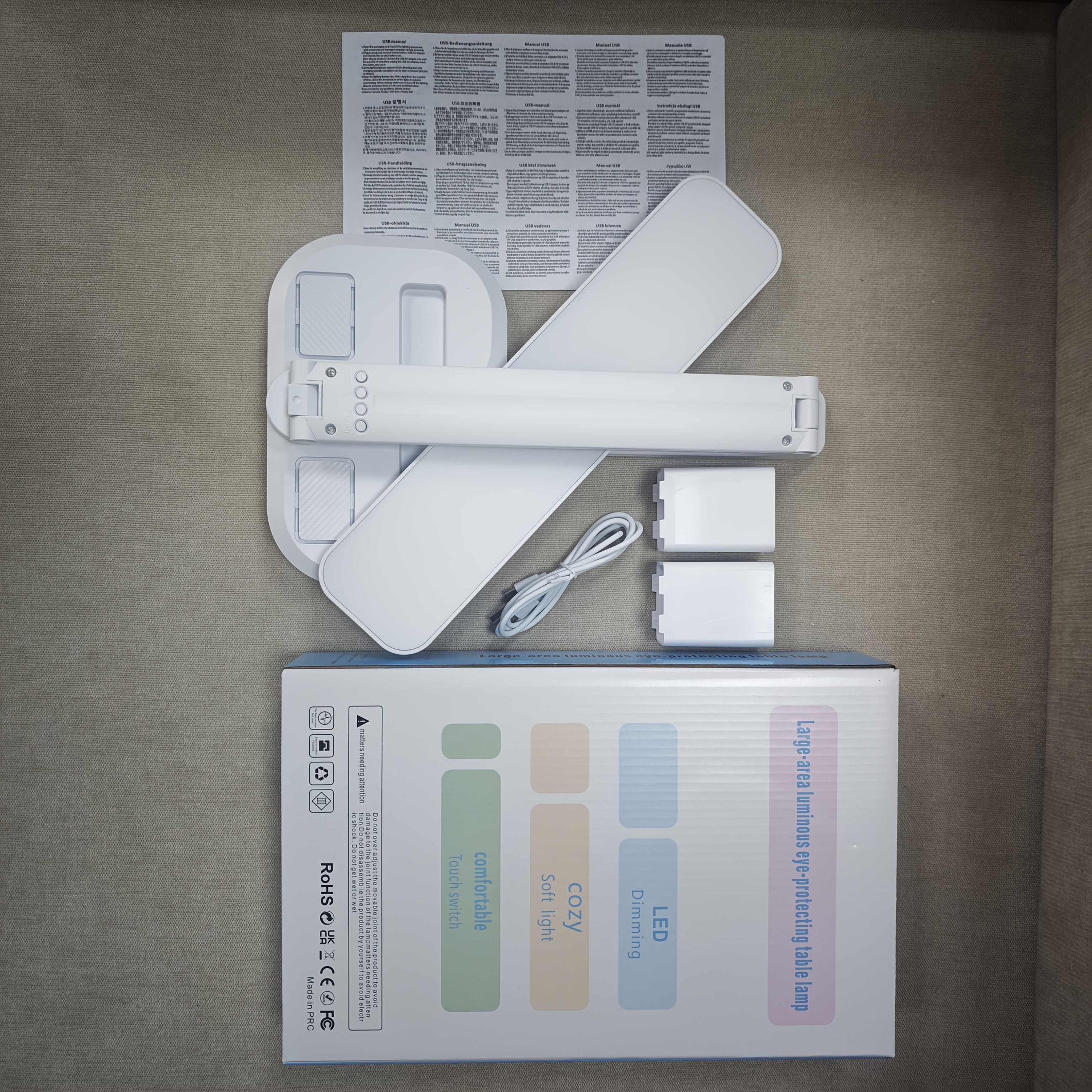 Digital Display Desk Lamp folded white lamp with USB cable, two detachable pen cups, instruction sheet and box.