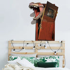 Dinosaur Breakout Wall Decal bedroom mockup above a wood headboard with string lights and green pillows