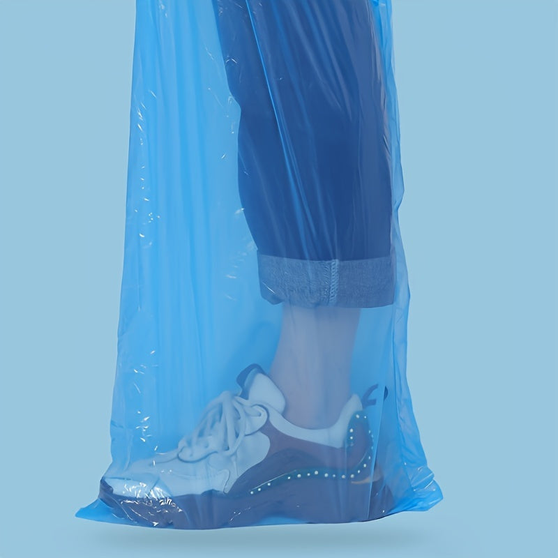 Blue Disposable Rain Pants detail showing the pant leg covering a sneaker