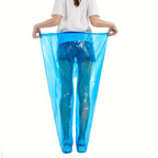 Blue Disposable Rain Pants shown with the elastic waistband stretched wide